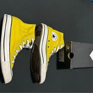 Yellow high top converse